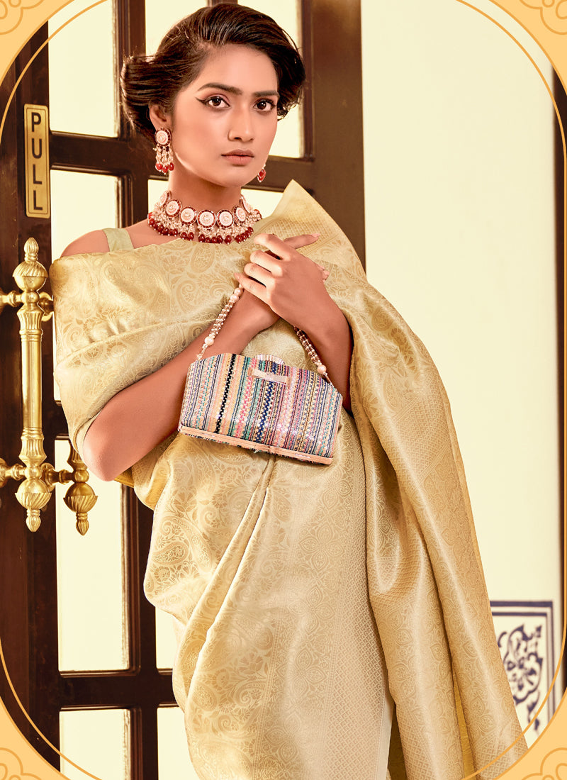 Cream Kanchipuram silk Weaving With Tassels Beautiful Saree