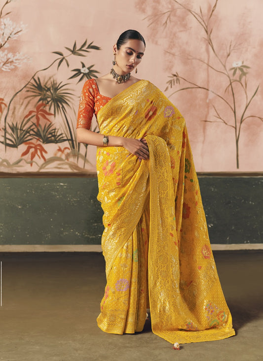 Yellow Khadi Georgette With Designer Weaving Work & Beautiful Tassels Bandhani Saree