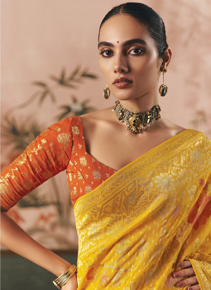 Yellow Khadi Georgette With Designer Weaving Work & Beautiful Tassels Bandhani Saree