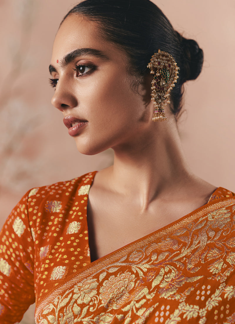 Orange Khadi Georgette With Designer Weaving Work & Beautiful Tassels Bandhani Saree