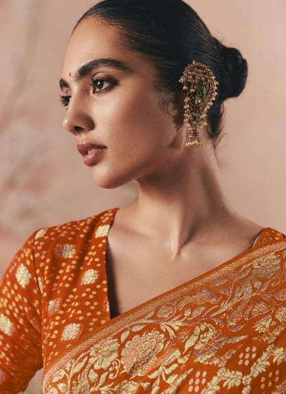 Orange Khadi Georgette With Designer Weaving Work & Beautiful Tassels Bandhani Saree