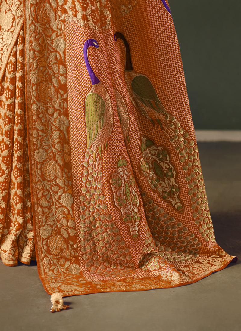 Orange Khadi Georgette With Designer Weaving Work & Beautiful Tassels Bandhani Saree