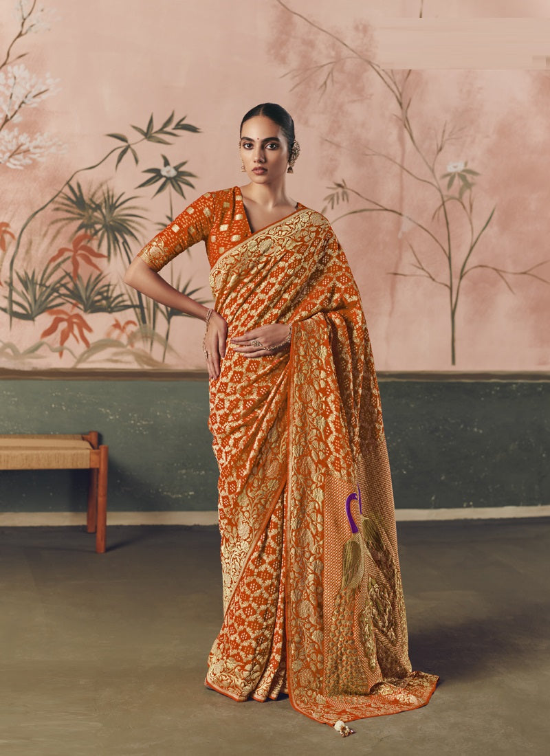 Orange Khadi Georgette With Designer Weaving Work & Beautiful Tassels Bandhani Saree