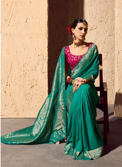 Turquoise Pure Viscose Silk With Zari Weaving & Tassel With Brocade Blouse